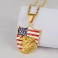Macro shot of gold shield pendant featuring eagle relief and American flag stars - Gold Eagle Shield Pendant Only (Without Chain)