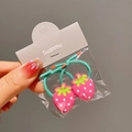 Close-up of pink strawberry charms on green elastic hair ties for girls - Strawberry Shape / Strawberry
