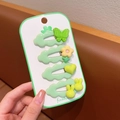Dettaglio di quattro fermagli per capelli a fumetto con farfalle e conigli color crema - 3# Serie Verde