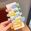Colorful 7-piece girls hair clip set with flower and heart shapes on display card - Blue Series