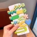 Colorful matte resin hair clip set with flower and heart shapes on display card - Green Series