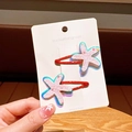 Set of 2 cute red star hair clips with glitter pink finish and iridescent edges - Pink Hair Clip