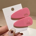 Zwei glänzende rosa Acetat-Haarspangen in Tropfenform mit France Handmade-Schriftzug - Rosenrosa