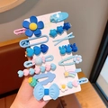 Set de horquillas azules para niñas con flores estrellas y conejos en tarjeta - Serie Azul