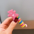 Pink resin bear hair clip with colorful spiral wire wrap and durable metal duckbill grip - Little Bear