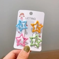 Set of four colorful star-shaped matte hair clips for girls in blue orange pink and green - Star Orange