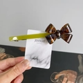 Green and tortoise shell acetate bow hair clip with vintage style and spring closure - Amber (X236)