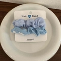 Set of two light blue elastic hair bands with floral patterns and ribbed texture - Blue Series
