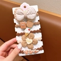 5-piece set of cute milk coffee colored hair ties with flower and bow charms on display card - Woven Bow and Emoji Cookie Ice Cream Style