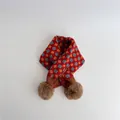 Close-up of knit geometric jacquard scarf with red argyle pattern and brown pom-poms - Red Base Khaki (9#)