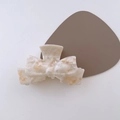 Handmade acetate bow hair claw clip in beige marble finish for elegant styling - Yellow/White