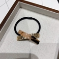 Elegant tortoiseshell acrylic and gold hammer metal hair tie with durable black elastic band - Light Tortoiseshell