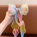 Regenbogen Haarschleife aus Organza mit langen Bändern und Perlen-Schmetterling-Detail - Regenbogen-Verlauf-Stil