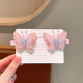 Paire de jolies barrettes papillon brodées roses avec détails d'ailes bleus fins - Broderie Rose