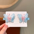 Set of two embroidered blue butterfly hair clips with delicate mesh and pearl details - Blue Embroidery