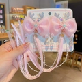 Pink ribbon bow hair clips with glitter reindeer antlers and pearl tassels - Xiu Ge Pink