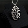 Macro shot of vintage Saint Christopher pendant with detailed embossed metal relief - St Christopher Pendant Only (Without Chain)
