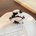 Elegant oval hollow acetate hair claw clip with black and white marble pattern design - Black and White Marble