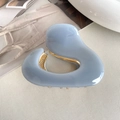 Elegant light blue heart-shaped hair claw clip with gold metal teeth and smooth texture - Blue