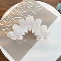 Elegant pearlescent white acetate hair claw clip with a wavy shell-like petal design - Mermaid Pearlescent White