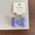 Sparkly purple sequin bow hair tie for girls on a white branded display card - 2-Purple