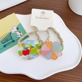 Kids colorful woven hair ties with acrylic flower and apple charms on a display card - 7-Red Green Apple