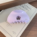 Elegante pinza per capelli a fiore lavanda con scritte dorate su libro vintage - Viola