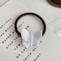 Brown elastic hair tie with white acetate butterfly featuring gold France Handmade text - Pearl White