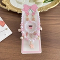 Pink and white ocean pearl jewelry set with starfish pendants on cardboard display - Pink