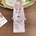 Purple and white mermaid pearl jewelry set with starfish pendants on a wooden background - Purple