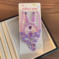 Purple beaded jewelry set for girls with heart pendants and crown ring on display - Purple