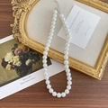 Elegant white pearl necklace for girls featuring a silver adjustable lobster clasp - 8mm Pearl Necklace