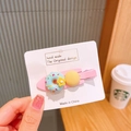 Pink hairpin with cute blue donut charm and yellow accent on a white display card - 2# Light Pink