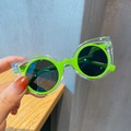 Kids polarized sunglasses featuring green inner round frames and cat ear clear outer frames - Green