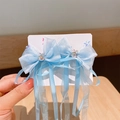 Light blue bow hair clips with long tassels and crystal rabbit charms for girls - Blue