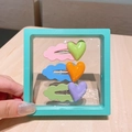 Three-piece set of cute candy-colored heart hair clips with wavy pastel bases - Green Heart Hair Clips