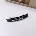 Fermaglio per capelli retrò nero con scritte larmood bianche e clip a molla in metallo - Nero