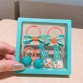 Set accessori capelli bimba verde menta con fiocchi e clip ciliegia in cornice - Assortimento Decorazioni Capelli Fiocco Verde