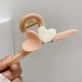 Elegant beige heart-shaped hair claw clip with cream accents and premium stitching detail - Light Pink