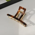 French vintage tortoiseshell pattern hair claw clip with gold metal spring for elegant bun - Shimmering Reddish Brown