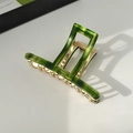 Elegant emerald green acetate rectangular hair claw clip with golden metal spring - Emerald Pattern / Shimmering Green
