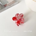 Detail view of 2.7cm acetate flower hair claw with red and white marble texture - Ink Red Marble