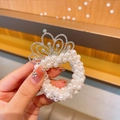 Girl's pearl hair tie featuring a sparkling silver crown with inlaid crystals - Fireworks Crown Style