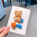 Set di fermagli per capelli azzurri con orsetto marrone e pompon di peluche arancione - Caffè/Marrone