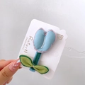 Handmade fabric tulip hair clip with light blue petals and fine pink embroidery detail - Blue