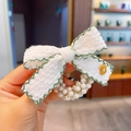 Sweet white bow hair tie with green wavy edges, yellow flower, and faux pearls - White Bow