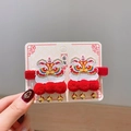 Détail de pinces à cheveux brodées lion de la danse du Nouvel An avec des clochettes - Paire de Cloches
