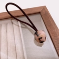 Elegant tulip-shaped tortoiseshell acetate hair tie with a dark brown elastic band - Light Leopard