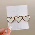 Fermaglio per capelli a cuore color tè al latte con finitura in smalto crema - Cuore Bianco Sporco