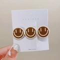 Milk tea brown hair clip with three smiling faces on a card for women accessory - Brown Big Smile